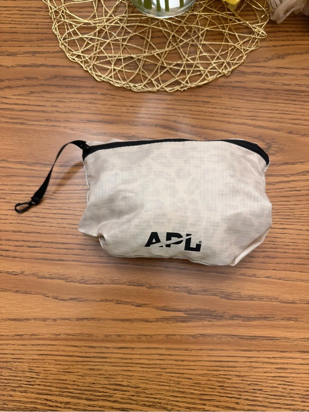 APL Beige TRAVEL Backpack with Leopard Accent and folds into small pouch..